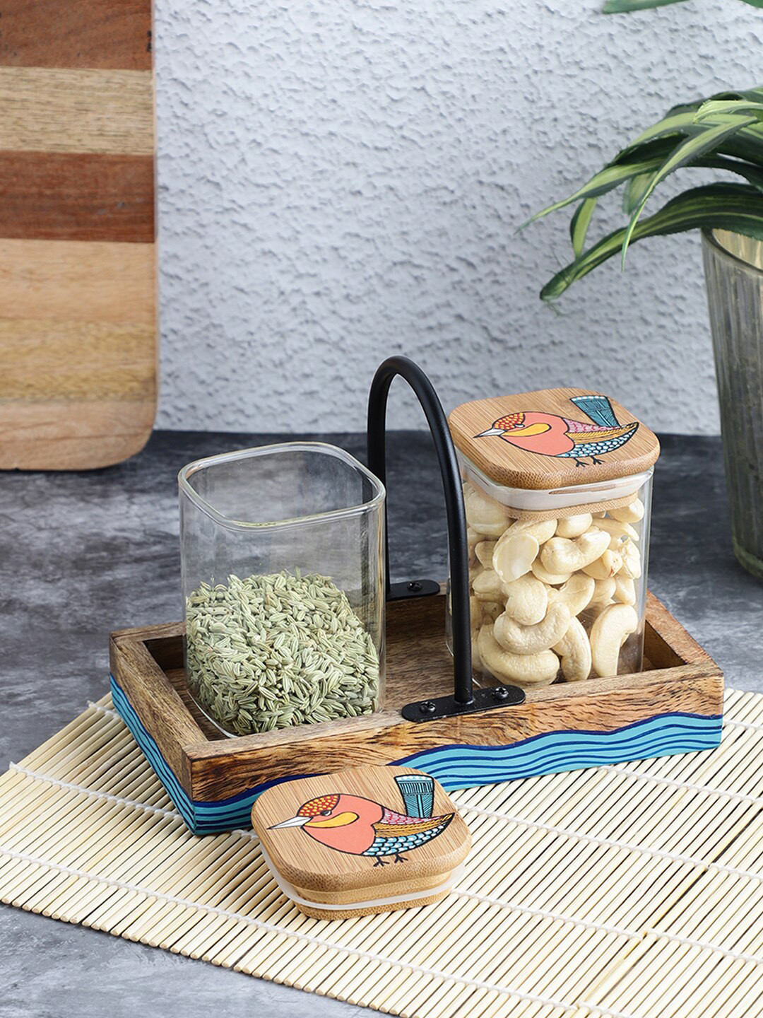 

VarEesha Transparent & Brown Set Of 2 Glass Jars with Hand Painted Gond Art Wooden Lids
