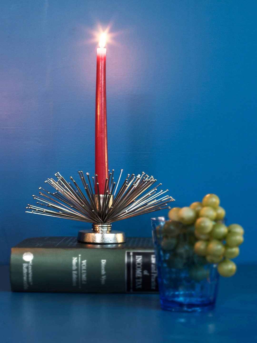 

The 7 DeKor Silver-Toned Decorative Candle Holder
