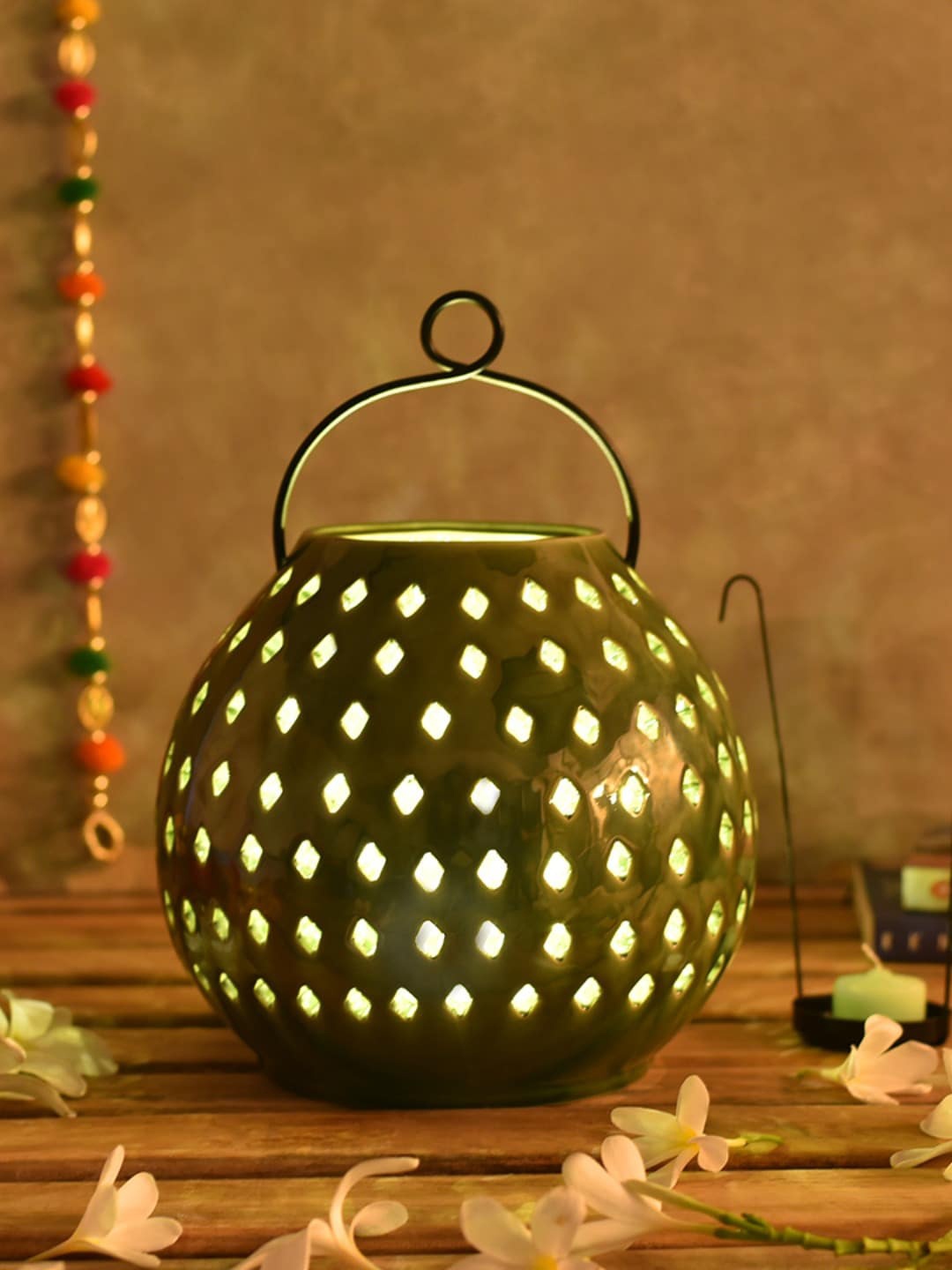 

The 7 DeKor Olive-Green Lantern Tea-Light Candle Holder
