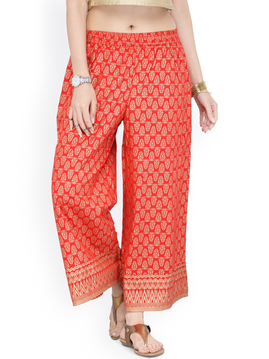 

Varanga Women Orange Flared Printed Palazzos