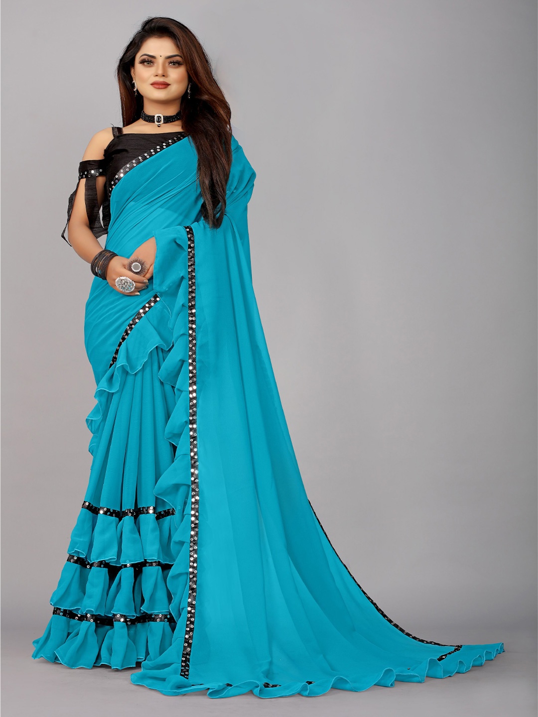 

B4ME COM Blue & Black Embellished Pure Georgette Ruffel Boarder Saree