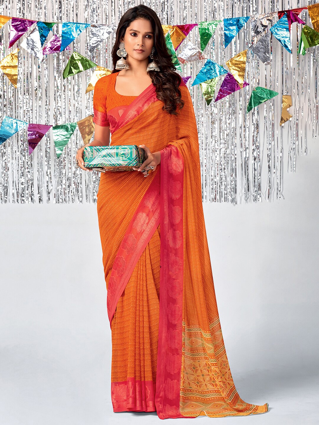 

Mitera Orange & Pink Floral Zari Pure Georgette Saree