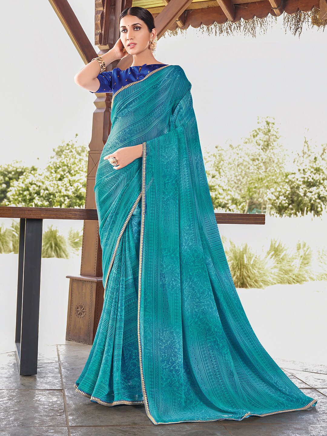 

Saree mall Teal & Gold-Toned Ethnic Motifs Printed Pure Georgette Sarees