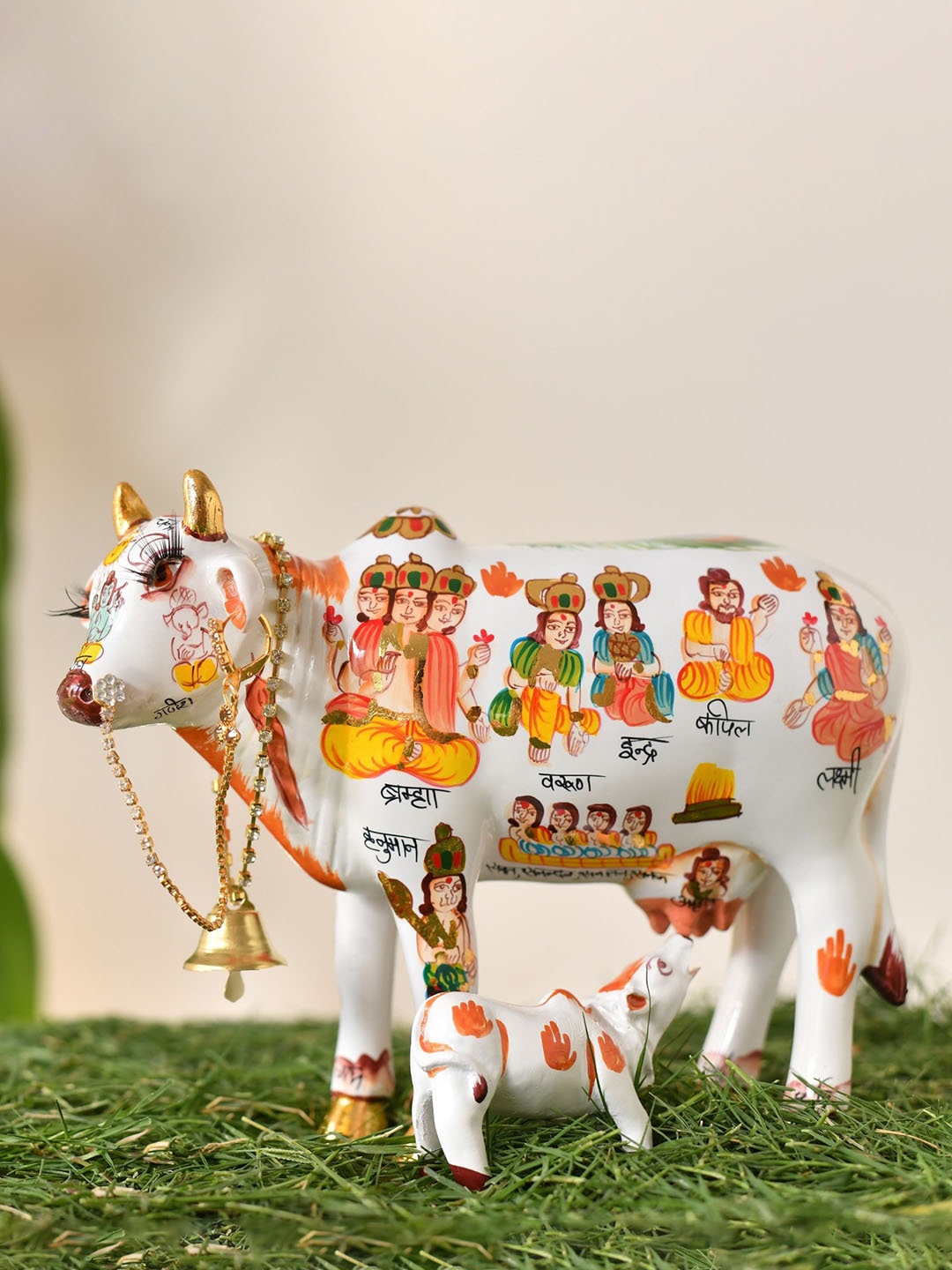 

Fashion Bizz White & Yellow Jodhpur Cow Showpiece