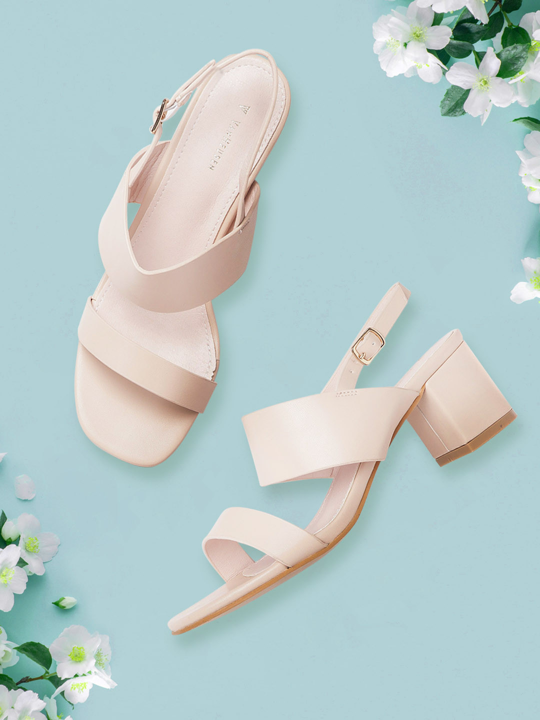 

Van Heusen Woman Beige Solid Block Heels