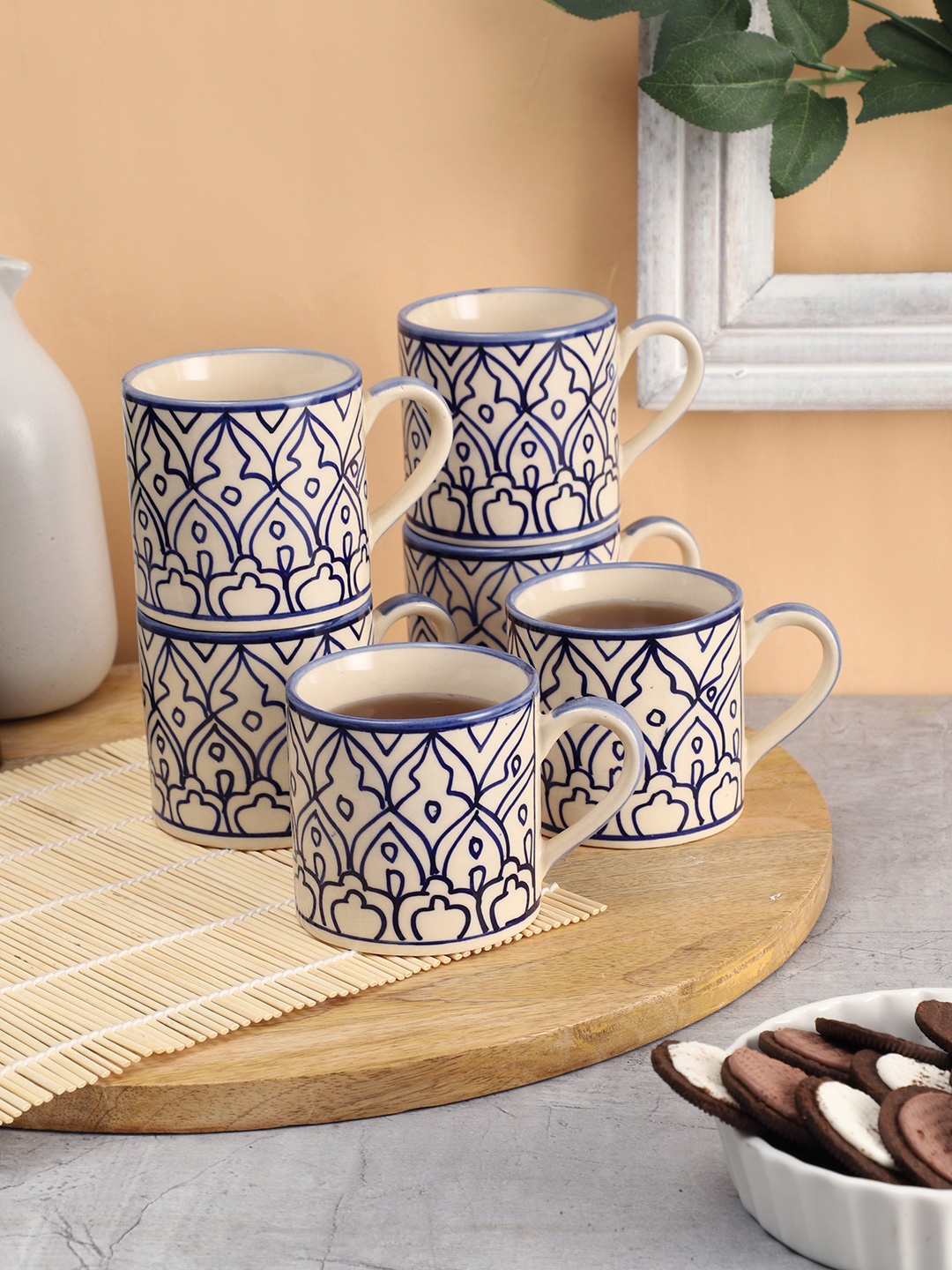 

VarEesha White And Blue Set Of 6 Hand painted Ceramic Glossy Mugs 150 ml Each, Off white