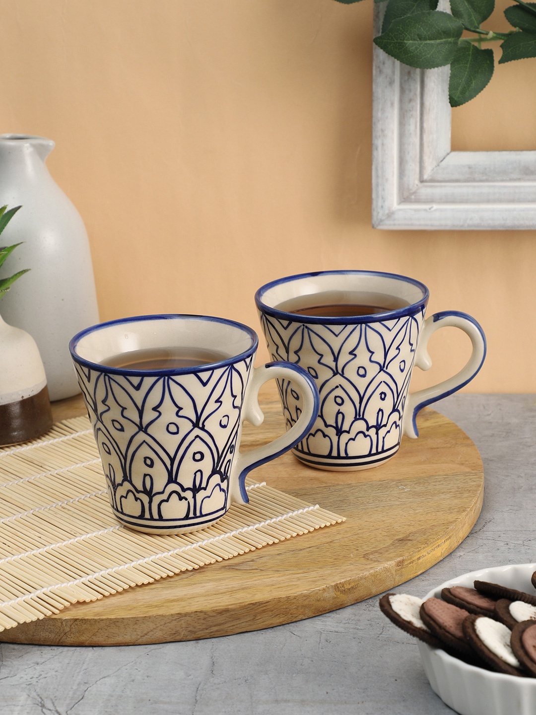 

VarEesha White And Blue Set Of 2 Hand Painted Ceramic Glossy Mugs 250 ml Each, Off white