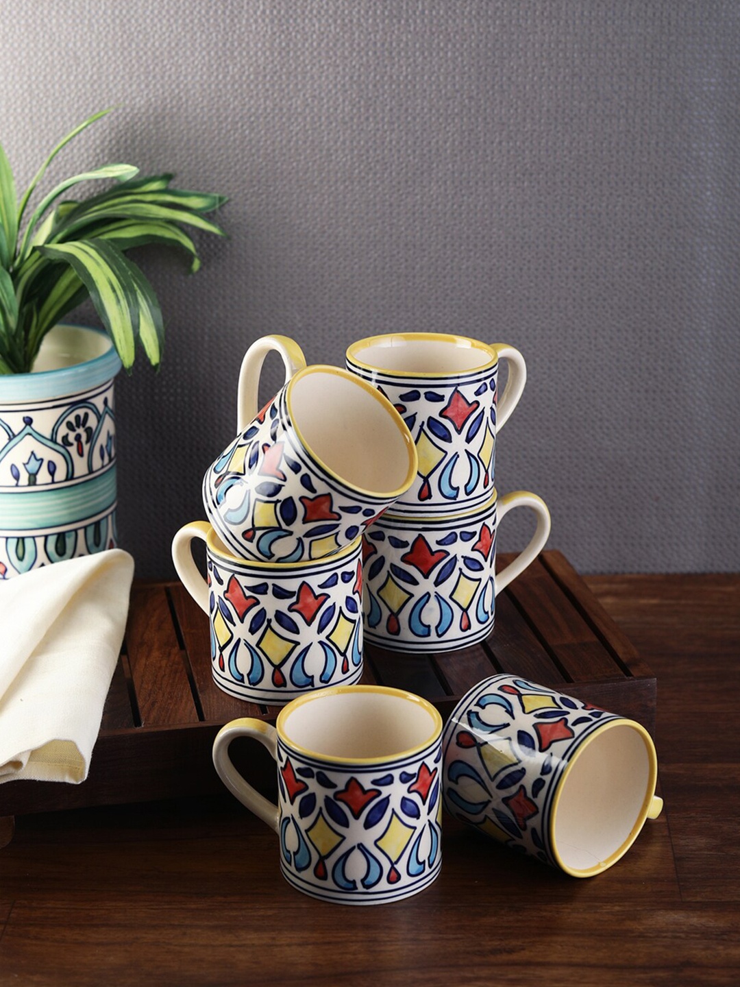 

VarEesha White And Blue Set Of 6 Printed Ceramic Mugs 150 ml, Yellow