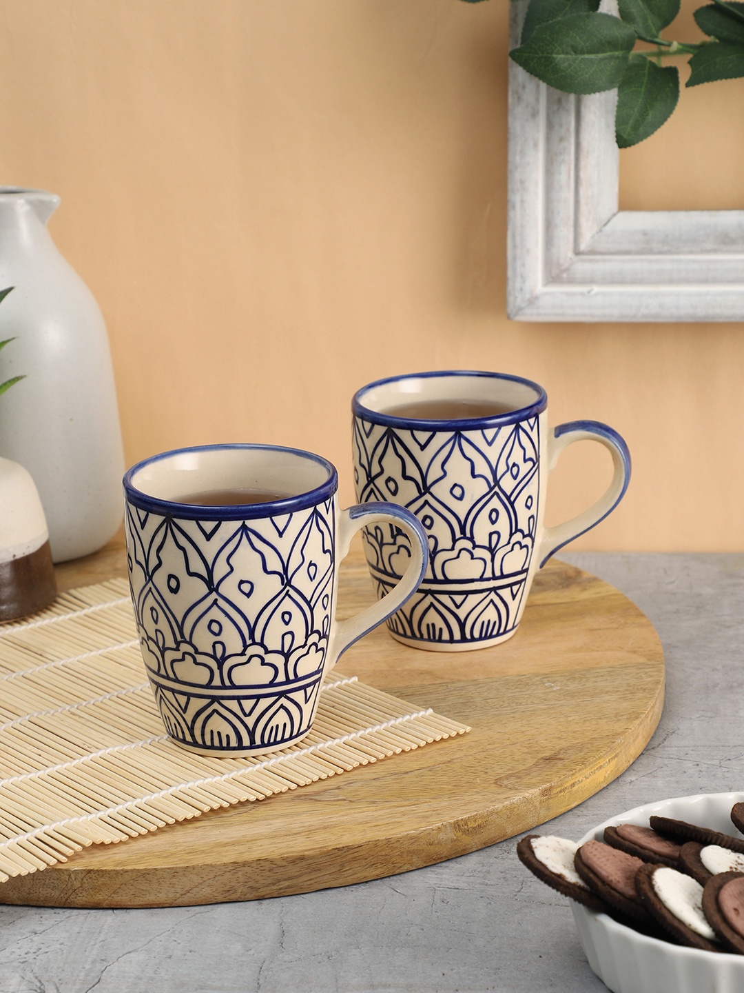 

VarEesha White & Blue Set Of 2 Printed Ceramic Mugs 300 ml Each, Off white