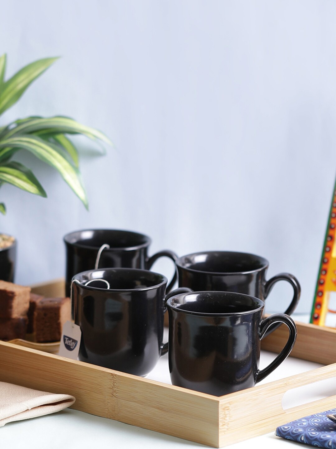 

VarEesha Black Set Of 4 Microwave Safe Ceramic Mugs 150 ml Each