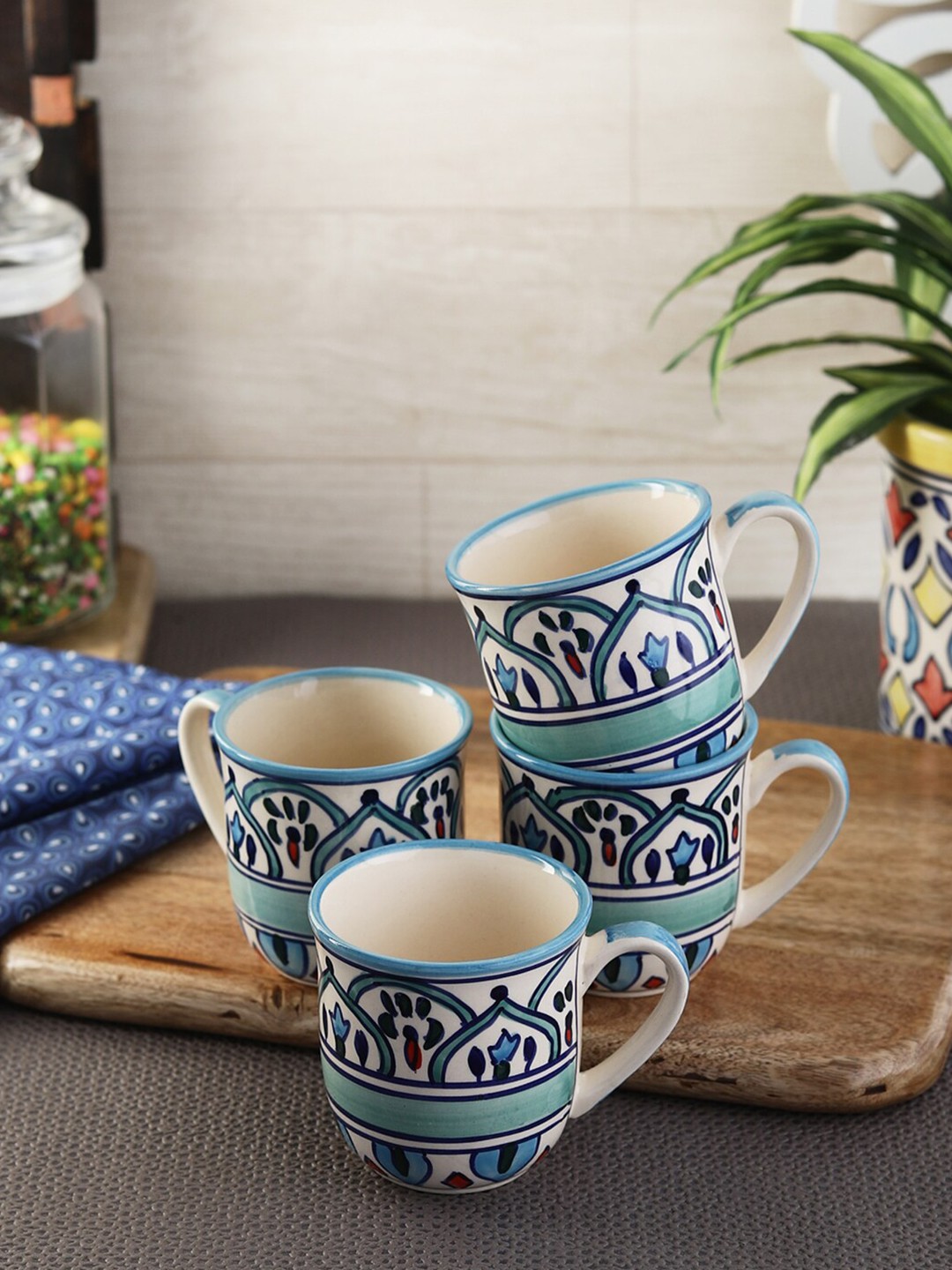 

VarEesha Set of 4 Blue Printed Ceramic Glossy Cups 150 ml Each, Off white