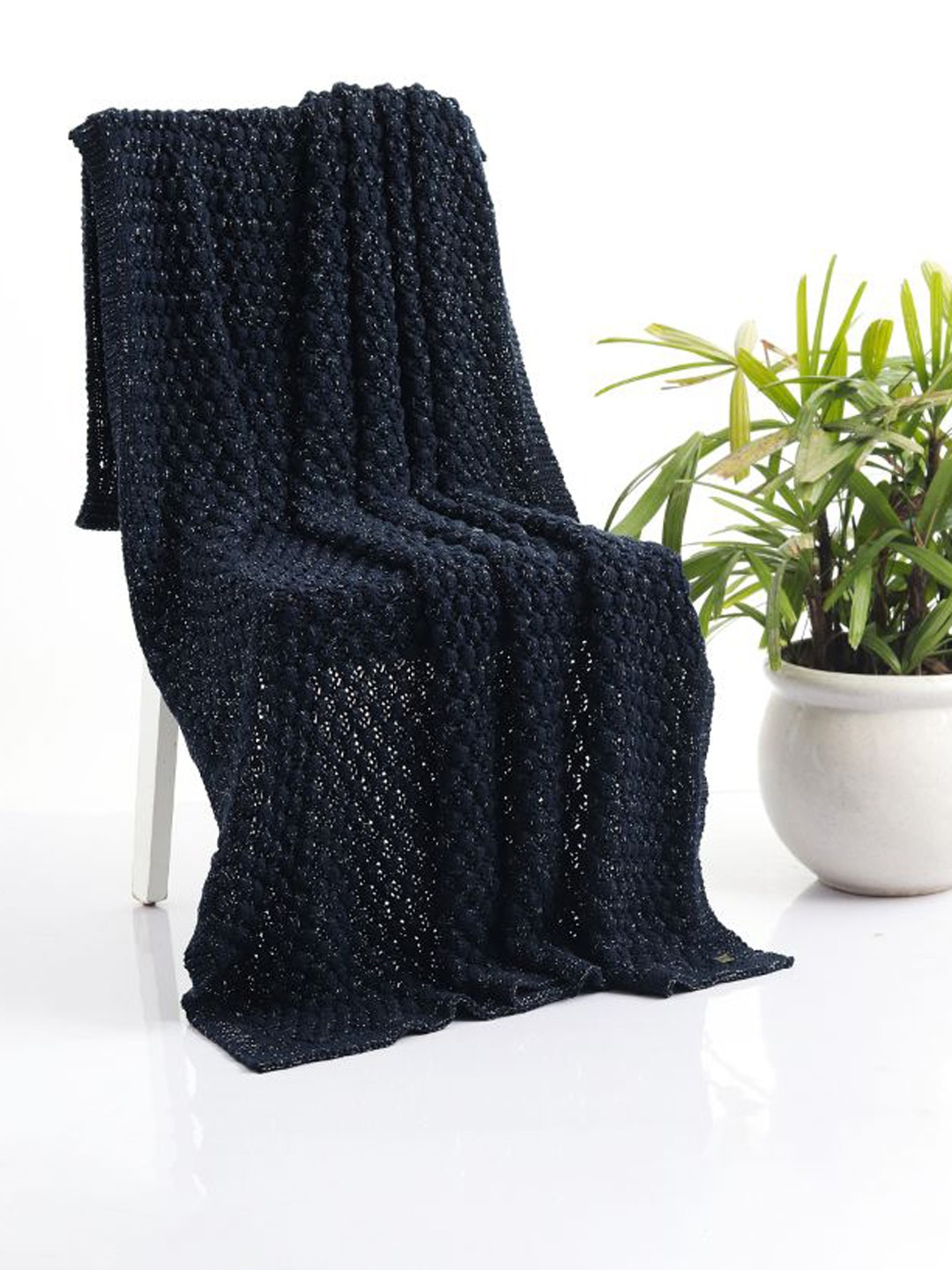 

Pluchi Navy Blue Self Design Knitted Pure Cotton Throws