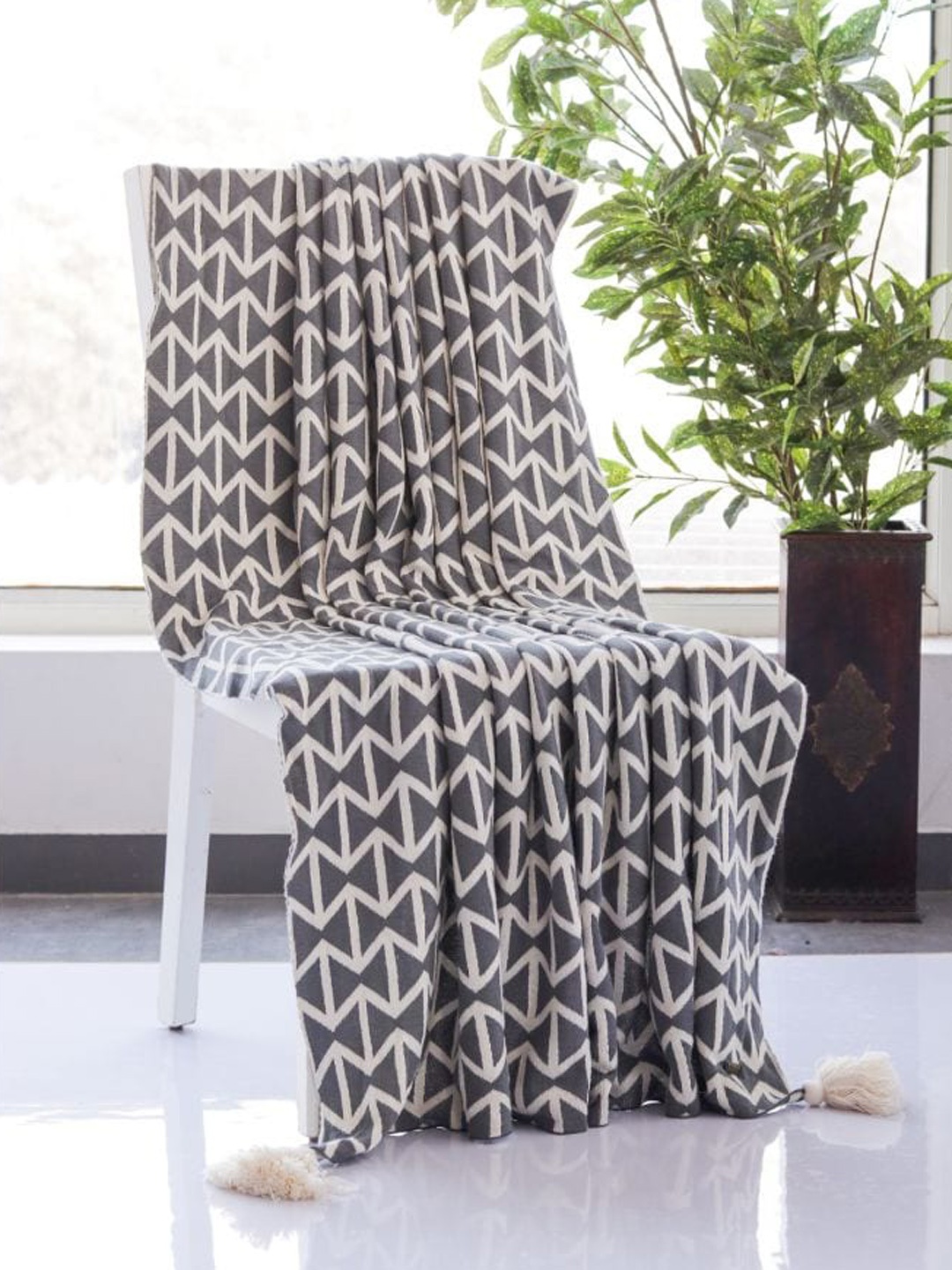 

Pluchi Grey Knitted Pure Cotton AC Throws Blanket
