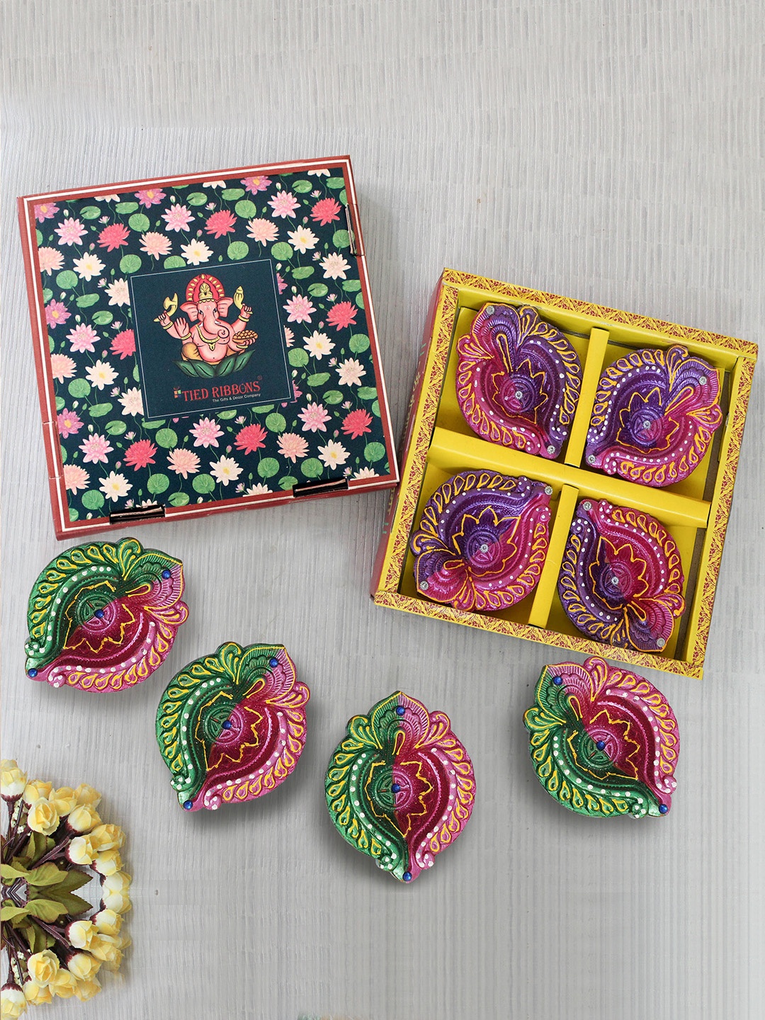 

TIED RIBBONS Set Of 8 Purple & Brown Printed Diyas