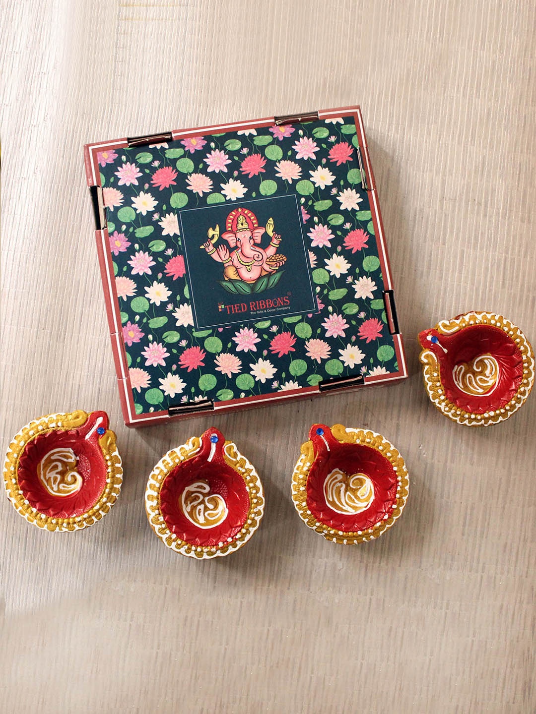 

TIED RIBBONS Set Of 4 Terracotta Diyas, Red