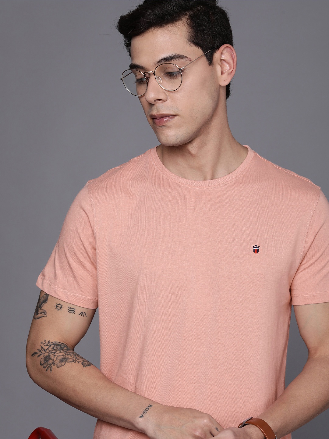 

Louis Philippe Jeans Men Pink Solid Pure Cotton T-shirt