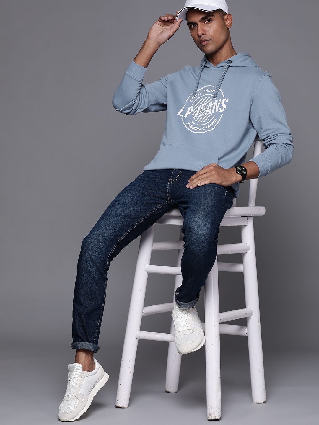 

Louis Philippe Jeans Men Blue & White Printed Cotton Hooded Sweatshirt