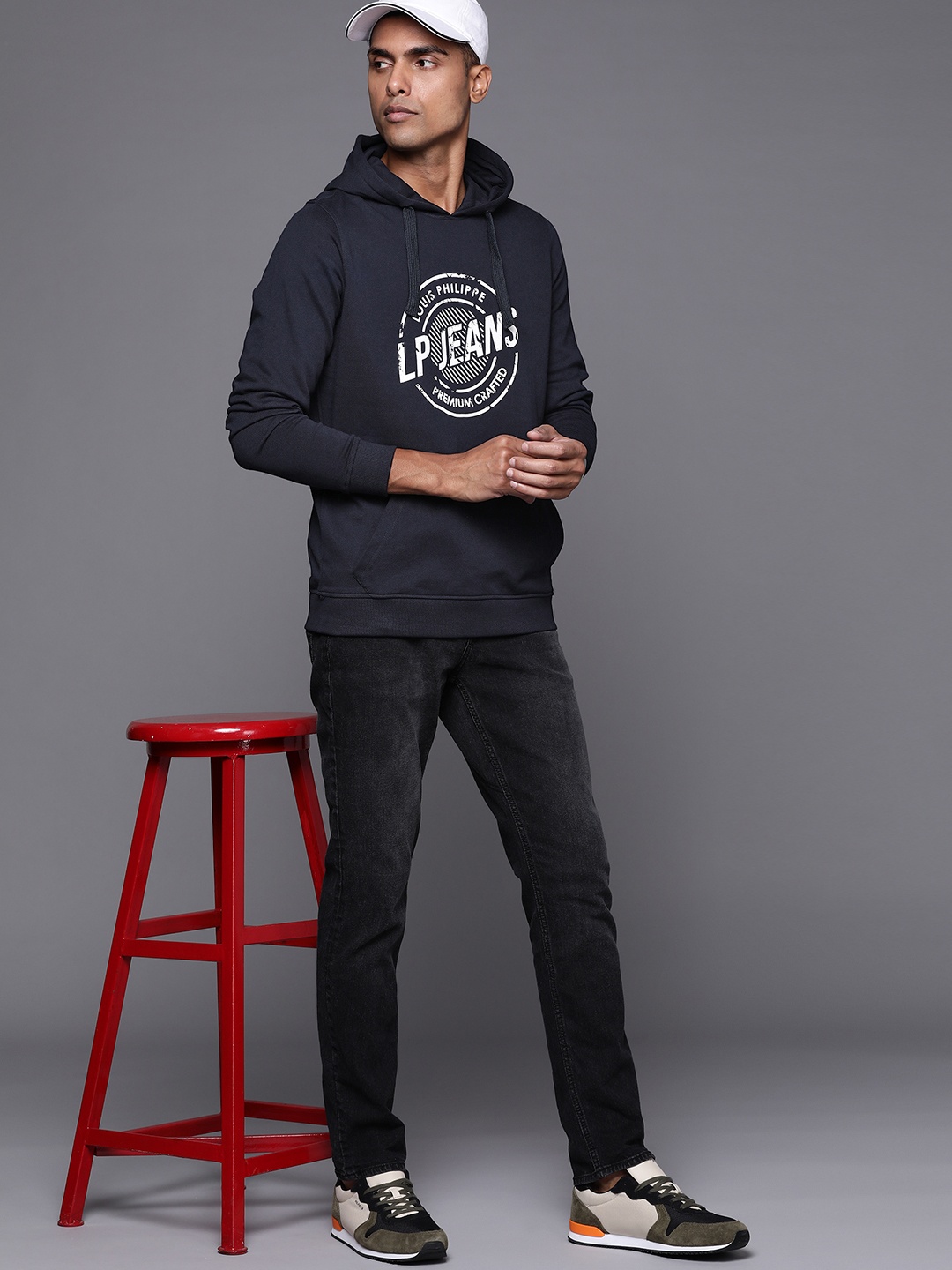 

Louis Philippe Jeans Men Navy Blue & White Pure Cotton Printed Hooded Sweatshirt