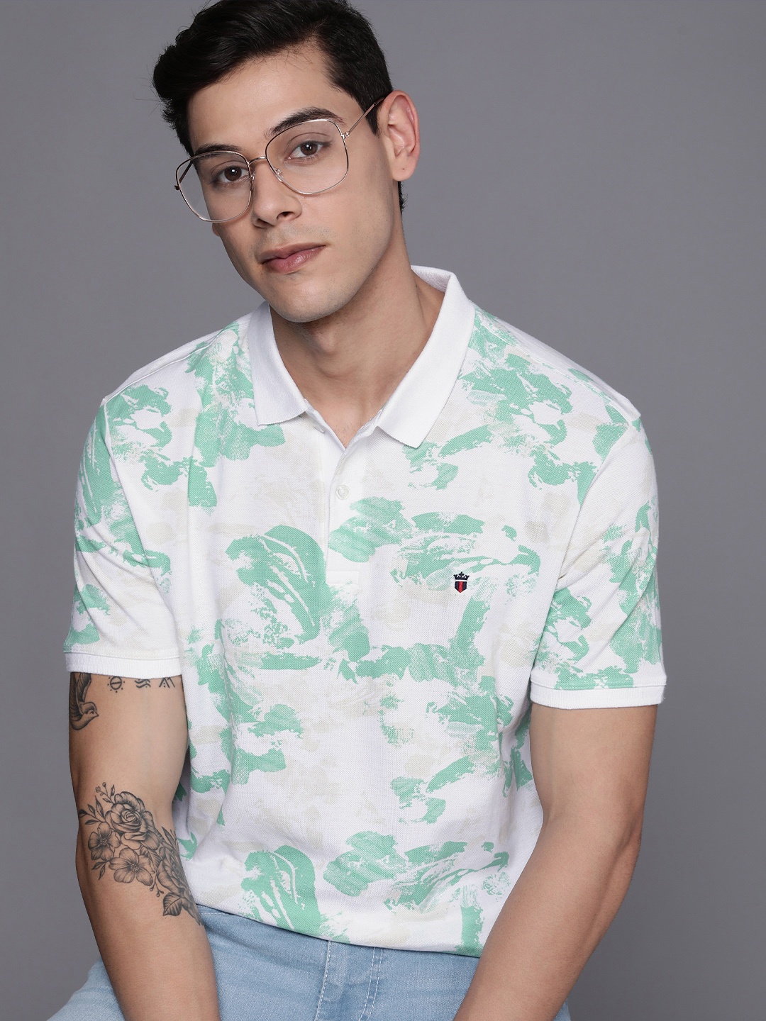 

Louis Philippe Jeans Men White & Green Abstract Printed Pure Cotton Slim Fit Polo T-shirt