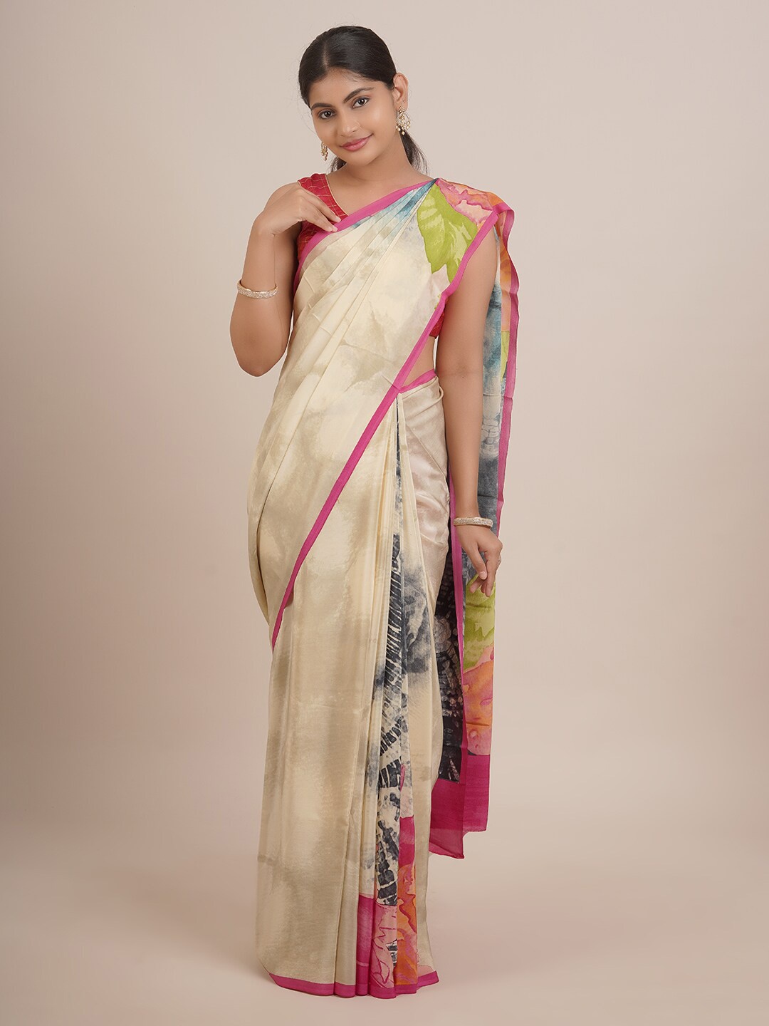 

Pothys Pink & Blue Floral Tissue Saree