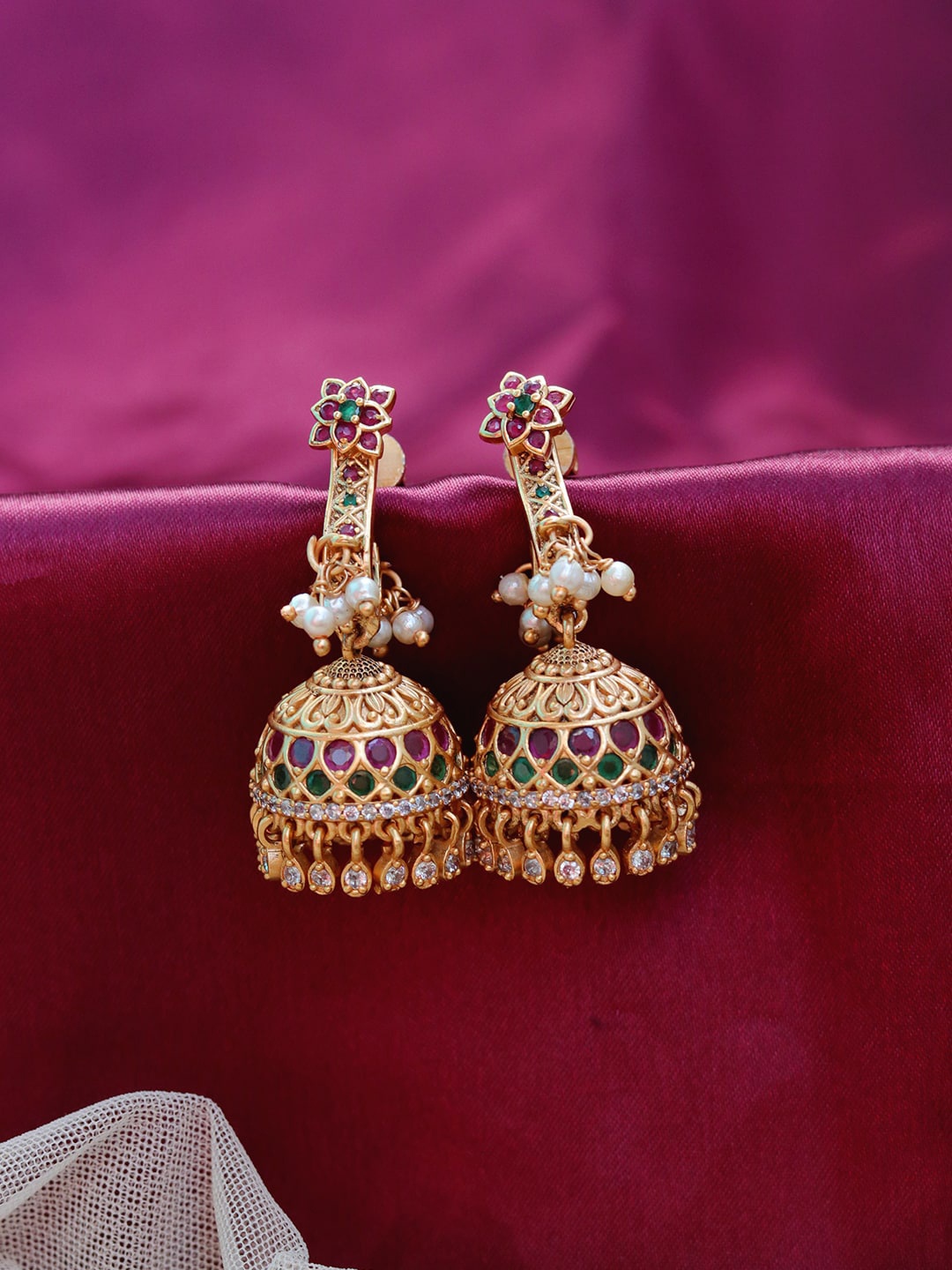 

Ishhaara Gold-Toned & White Classic Jhumkas Earrings