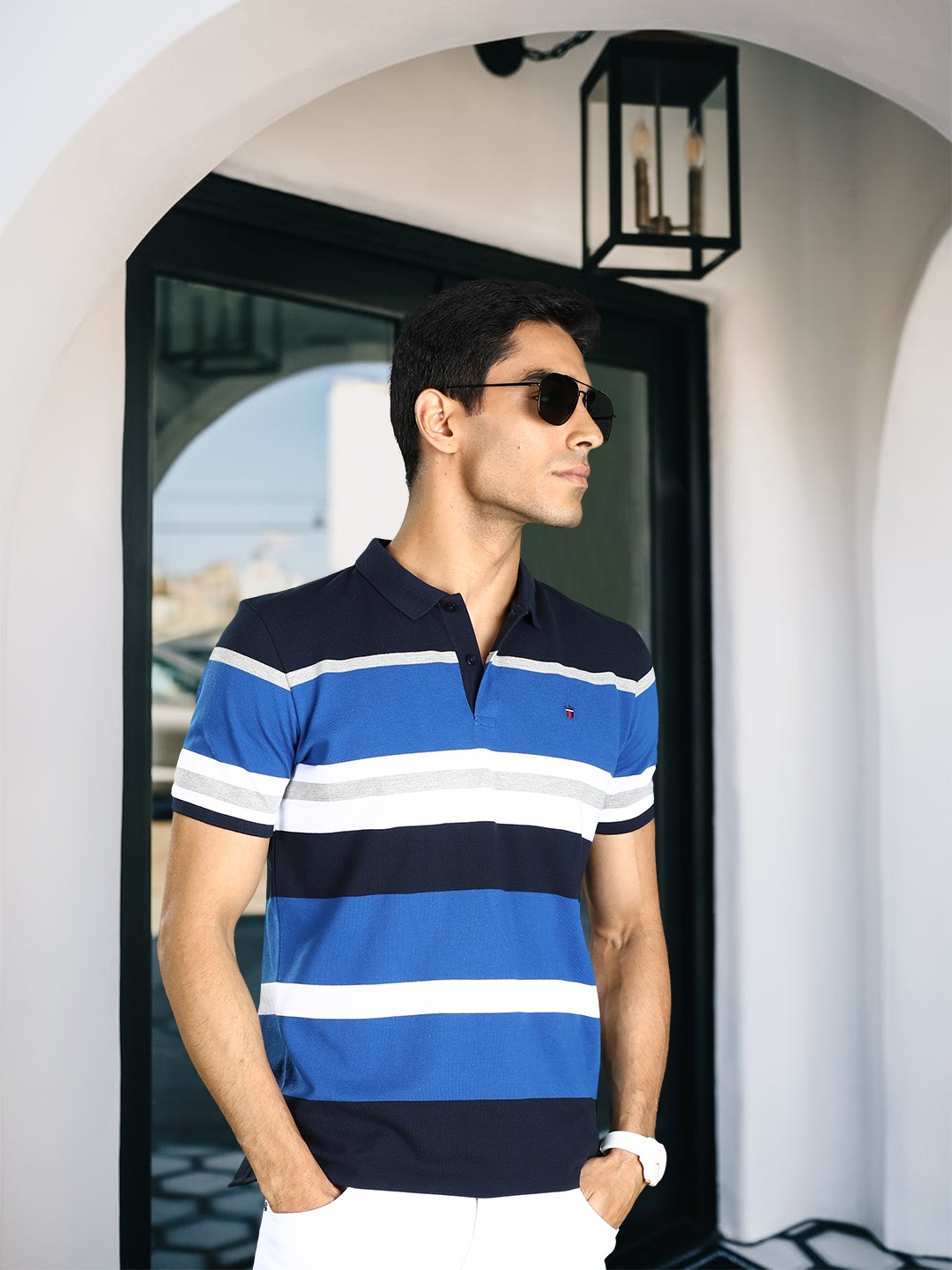

Louis Philippe Sport Men Navy Blue & White Striped Polo Collar T-shirt