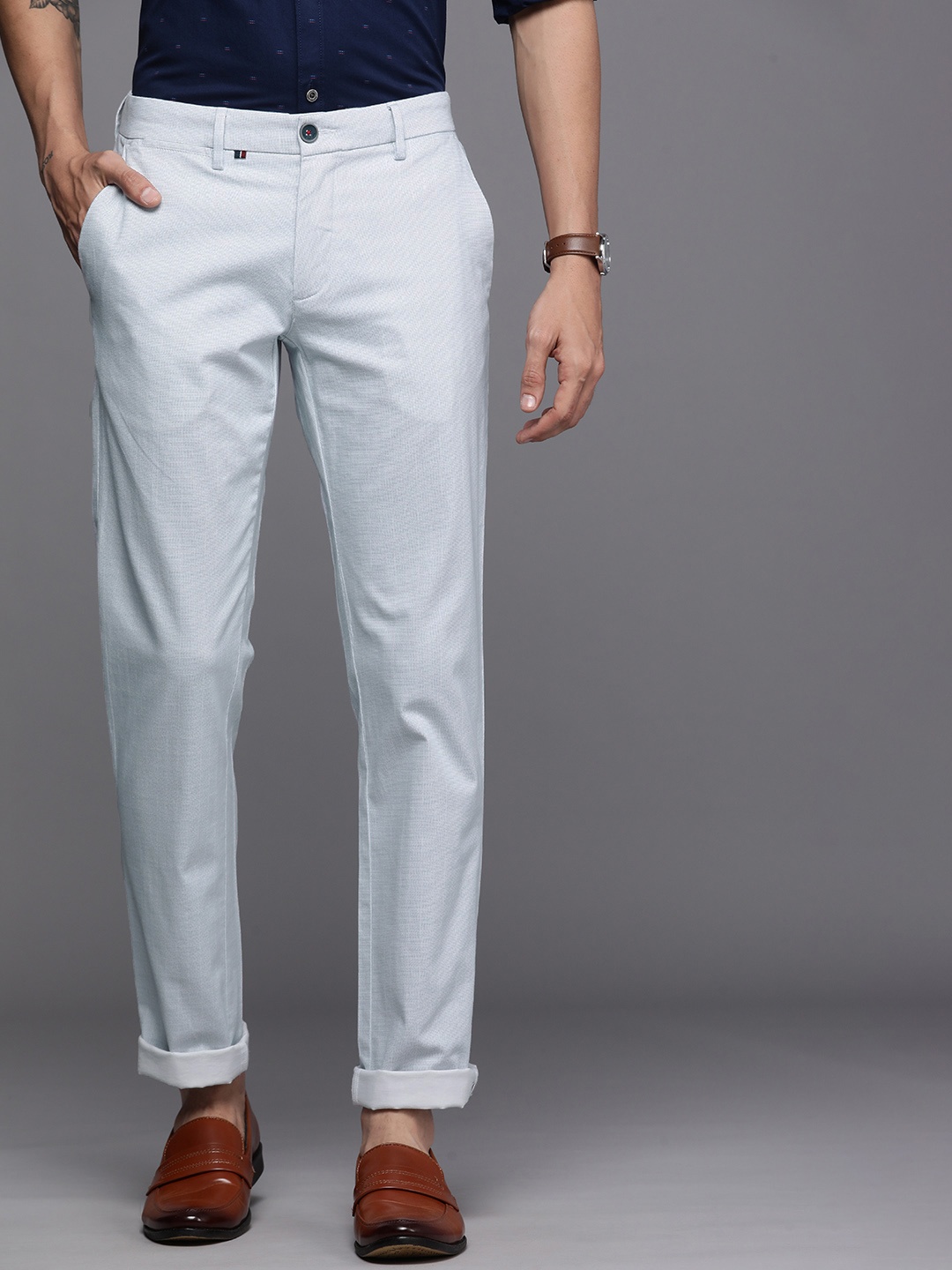 

Louis Philippe Sport Men Blue Geometric Printed Comfort Slim Fit Low-Rise Regular Trousers