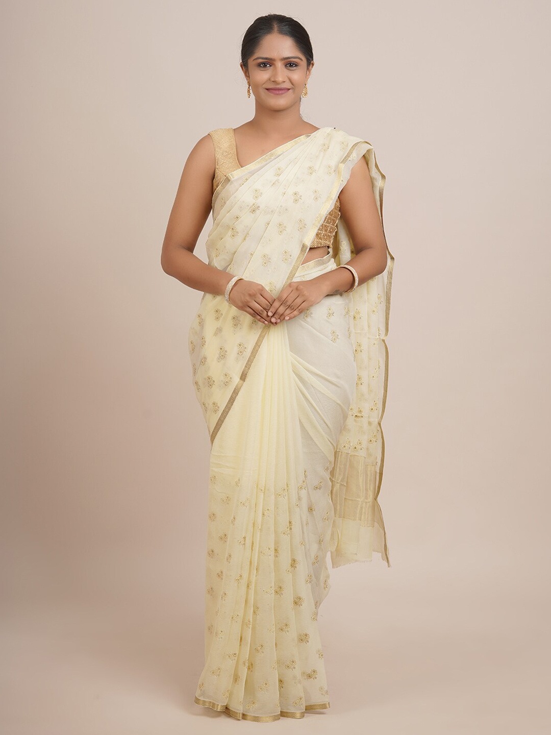 

Pothys Cream-Coloured & Gold-Toned Floral Zari Pure Chiffon Saree