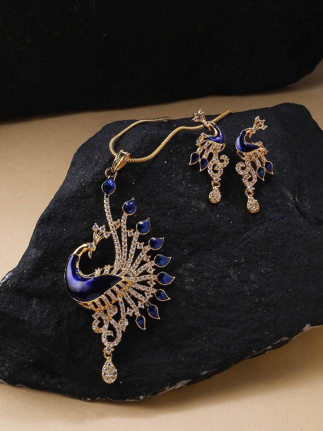 

VIRAASI Gold-Plated & Navy Blue American Diamond-Studded Jewellery Set