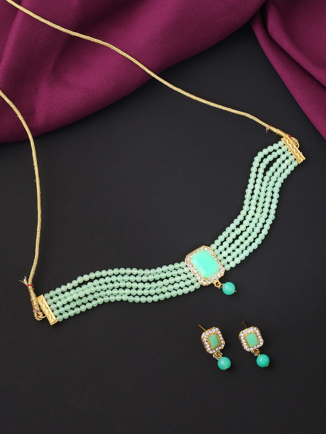 

VIRAASI Gold-Plated Green & White Stone-Studded & Beaded Jewellery Set