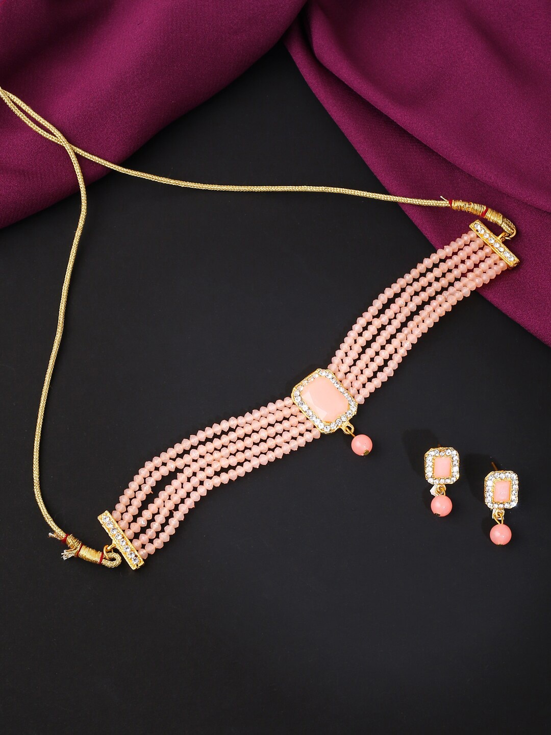 

VIRAASI Gold-Plated Peach-Colored Stone-Studded & Beaded Jewellery Set
