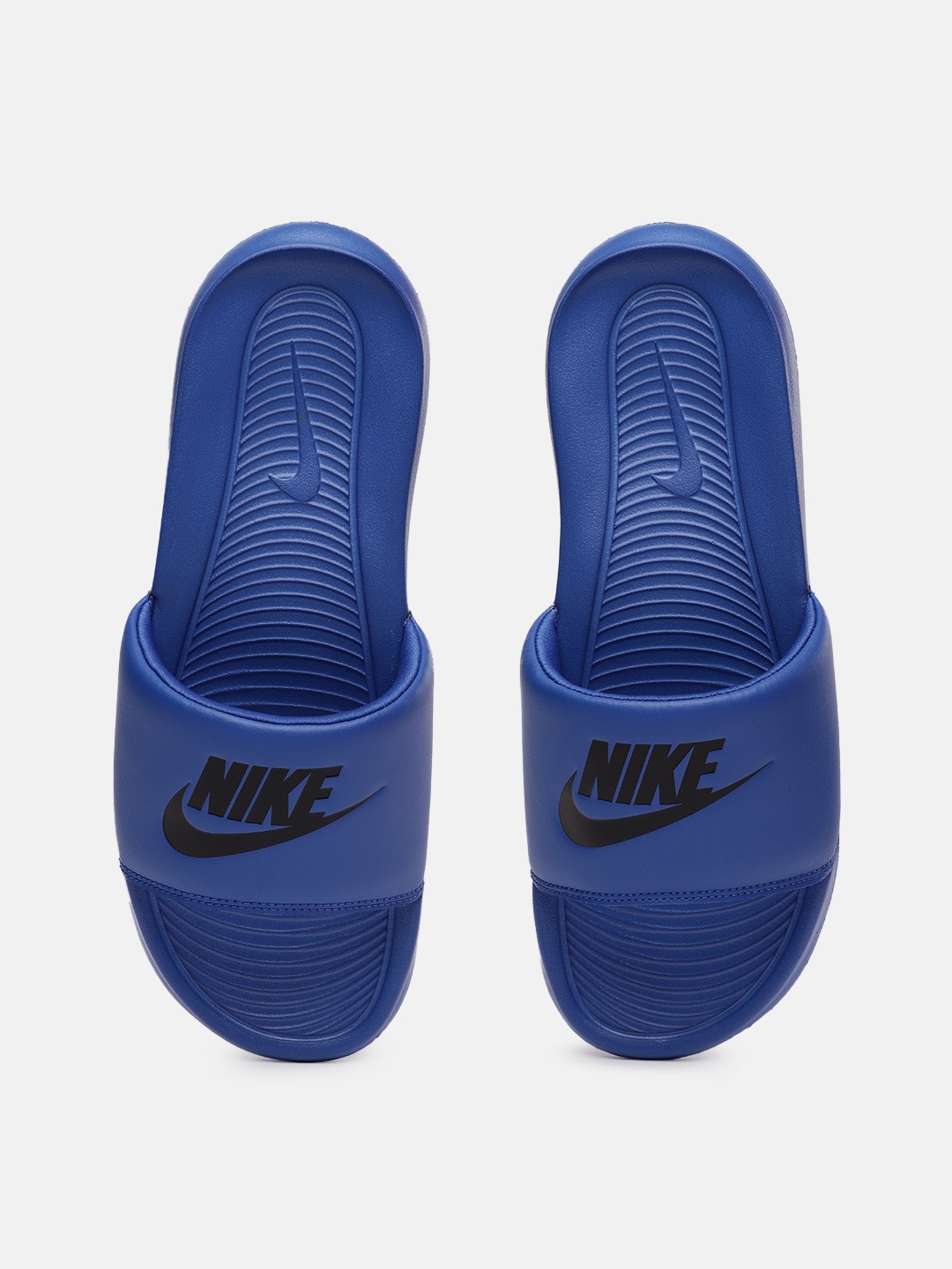 

Nike Men Blue & Black Printed VICTORI ONE Sliders