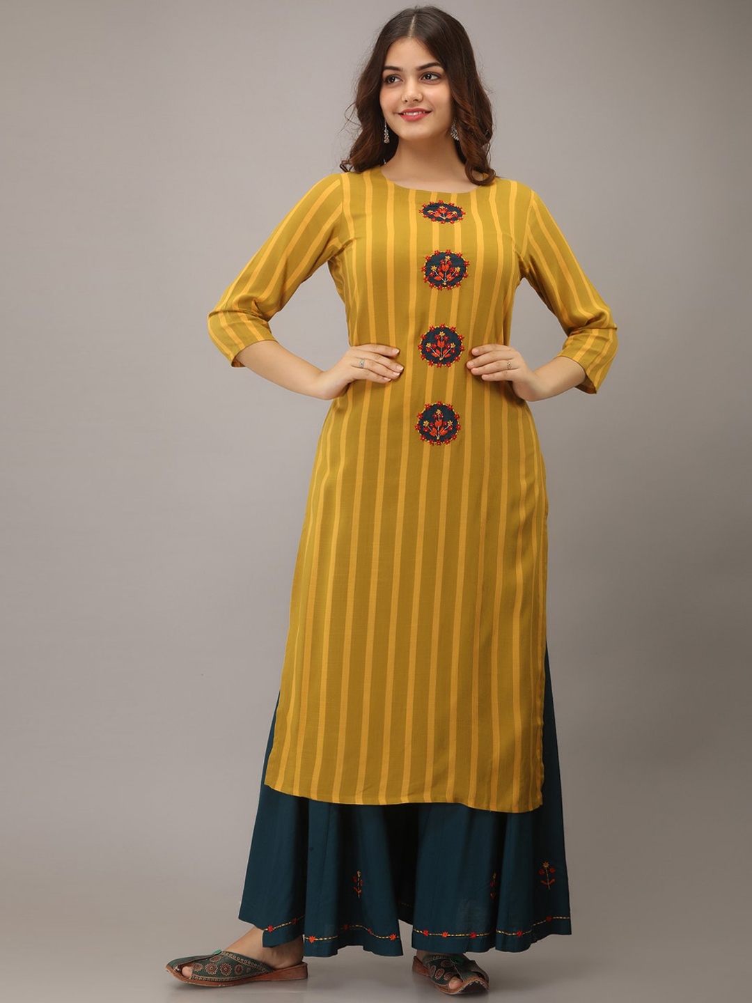 

KALINI Women Yellow Embroidered Kantha Work Kurta with Skirt