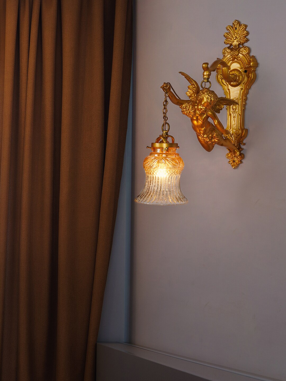

Fos Lighting Gold-Toned Gilded Cherub Wall Sconce with Glass Shade