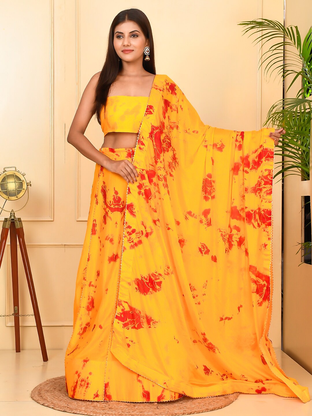 

Kesarya Yellow & Red Embellished Shibori Semi-Stitched Lehenga & Unstitched Blouse With Dupatta