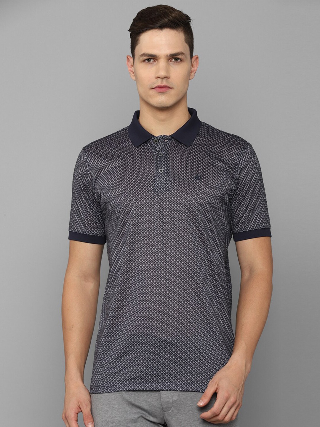 

Luxure by Louis Philippe Men Green Cotton Printed Geometric Polo Collar T-shirt