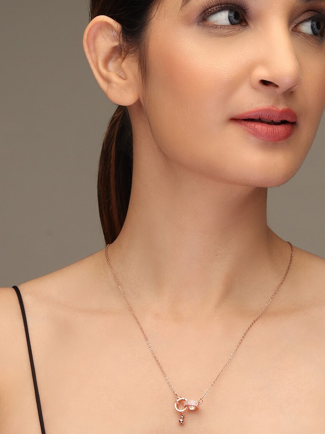 

LAIDA Women Rose Gold-Plated & White AD-Stone Studded Interlocked Pendant With Chain