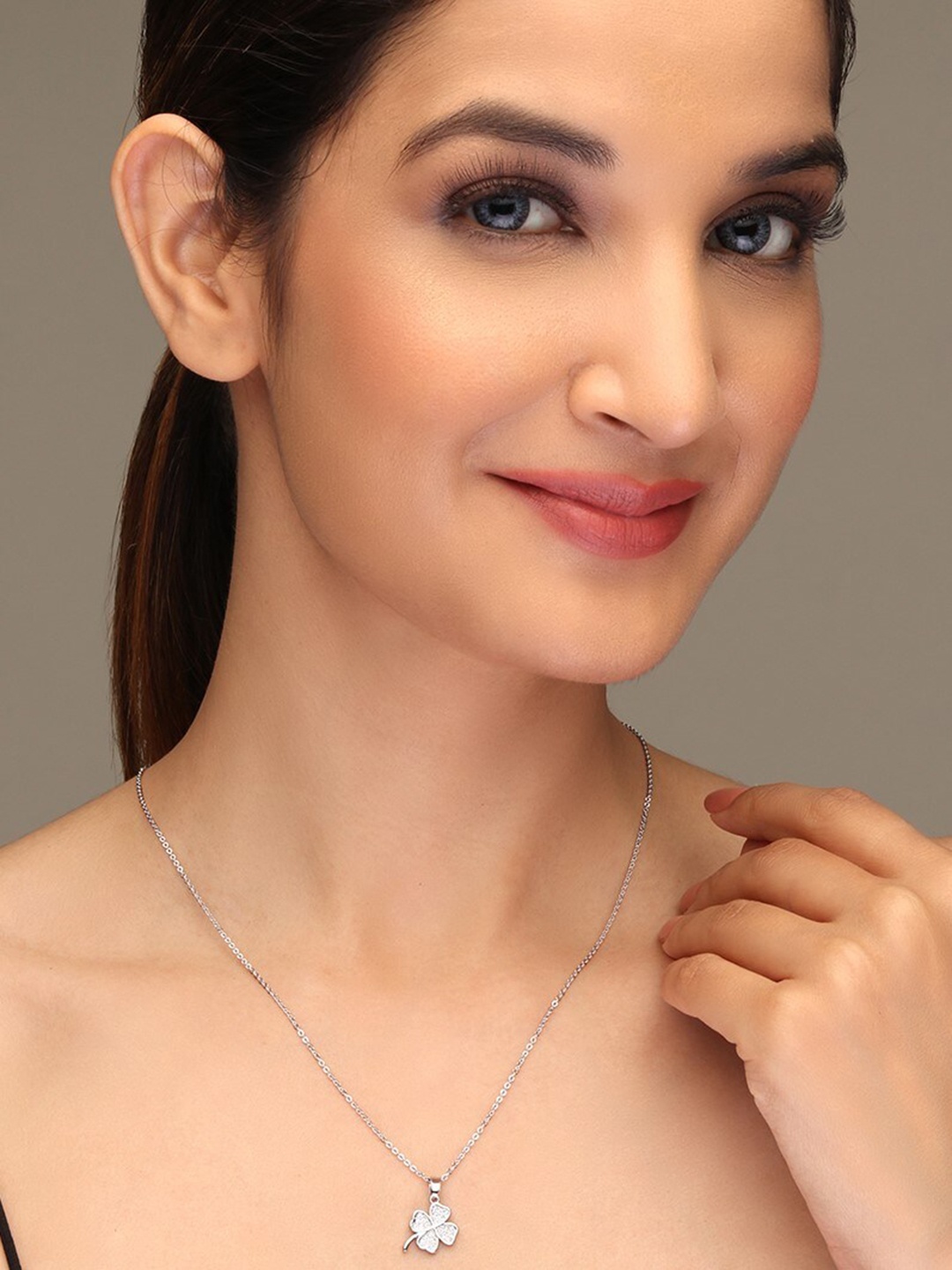 

LAIDA Women Silver-Plated & White Stone Studded Clover Leaf-Shaped Pendant With Chain