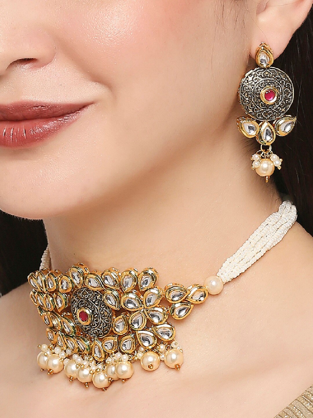 

OOMPH Gold-Toned Red & White Kundan Studded and Beaded Jewellery Set