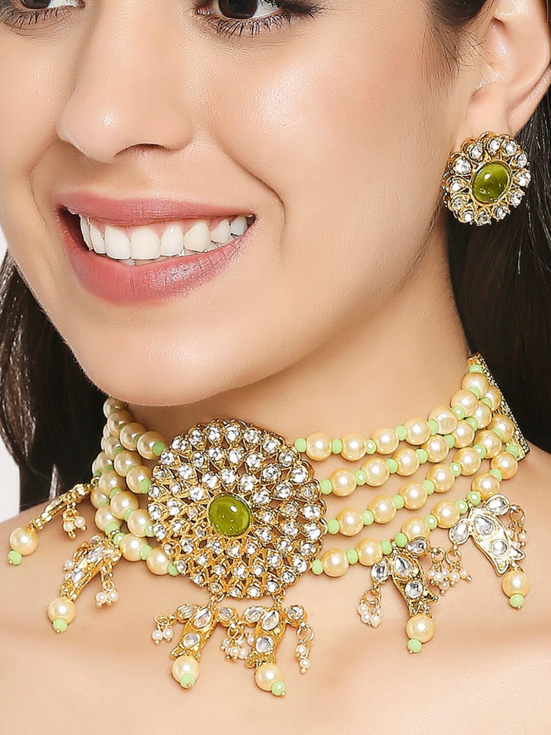 

OOMPH Gold-Toned Green and White Kundan Studded and Beaded Layered Jewellery Set