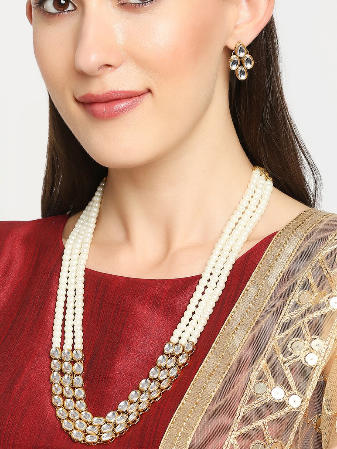 

OOMPH Gold-Toned White Kundan Studded & Beaded Jadau Jewellery Set