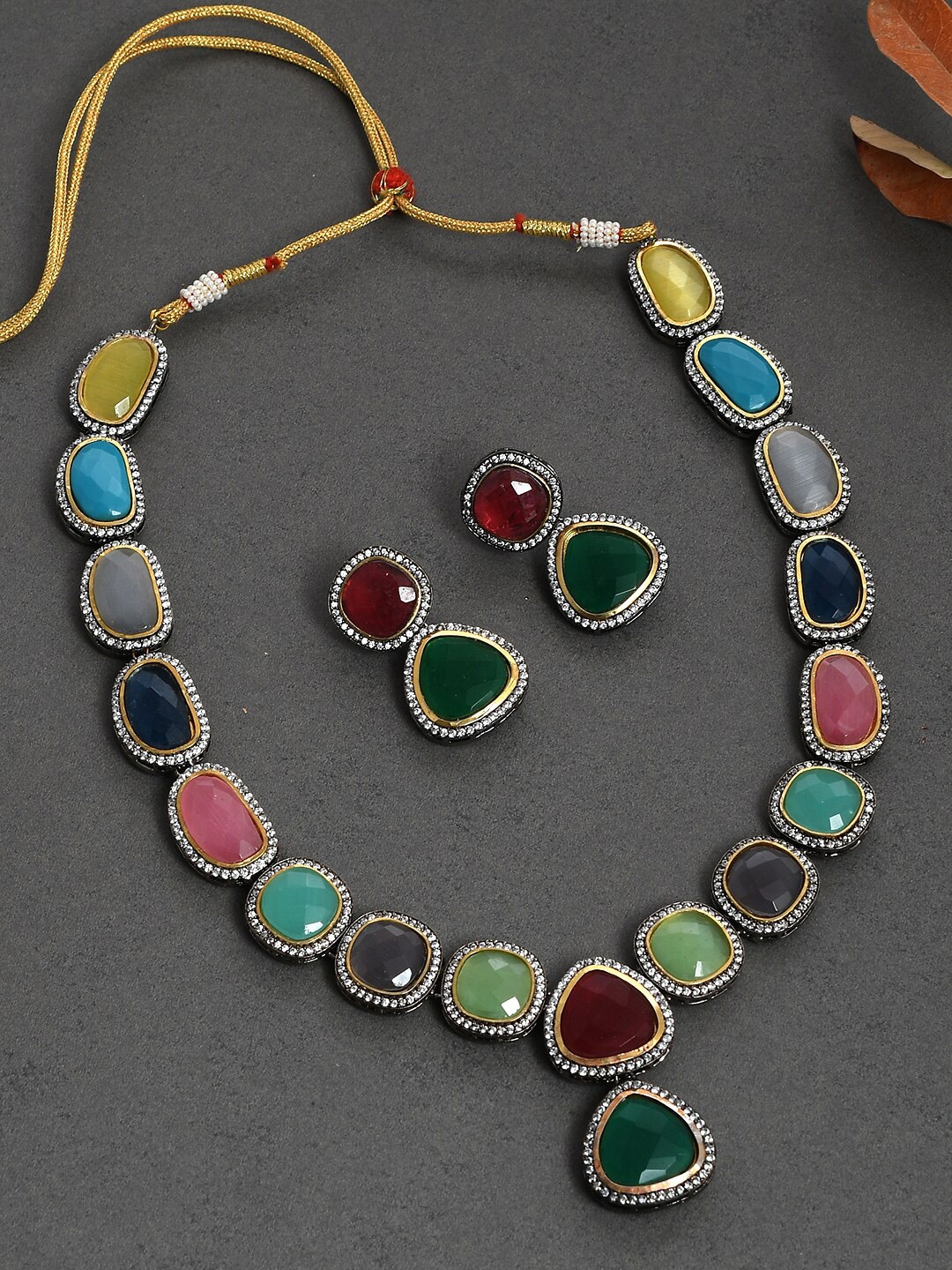 

Silvermerc Designs Green and Maroon Gold-Plated Quartz Studded Bridal Jewellery Set