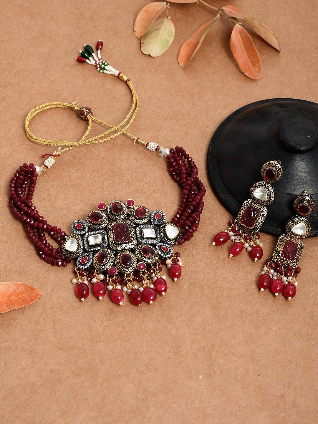 

Silvermerc Designs Gold-Plated Maroon Kundan-Studded & Beaded Choker Jewellery Set