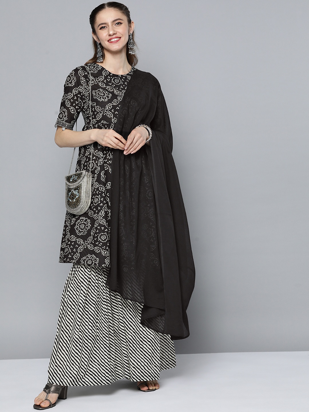 

HERE&NOW Women Black & Off-White Printed Anarkali Cotton Kurta with Sharara & With Dupatta