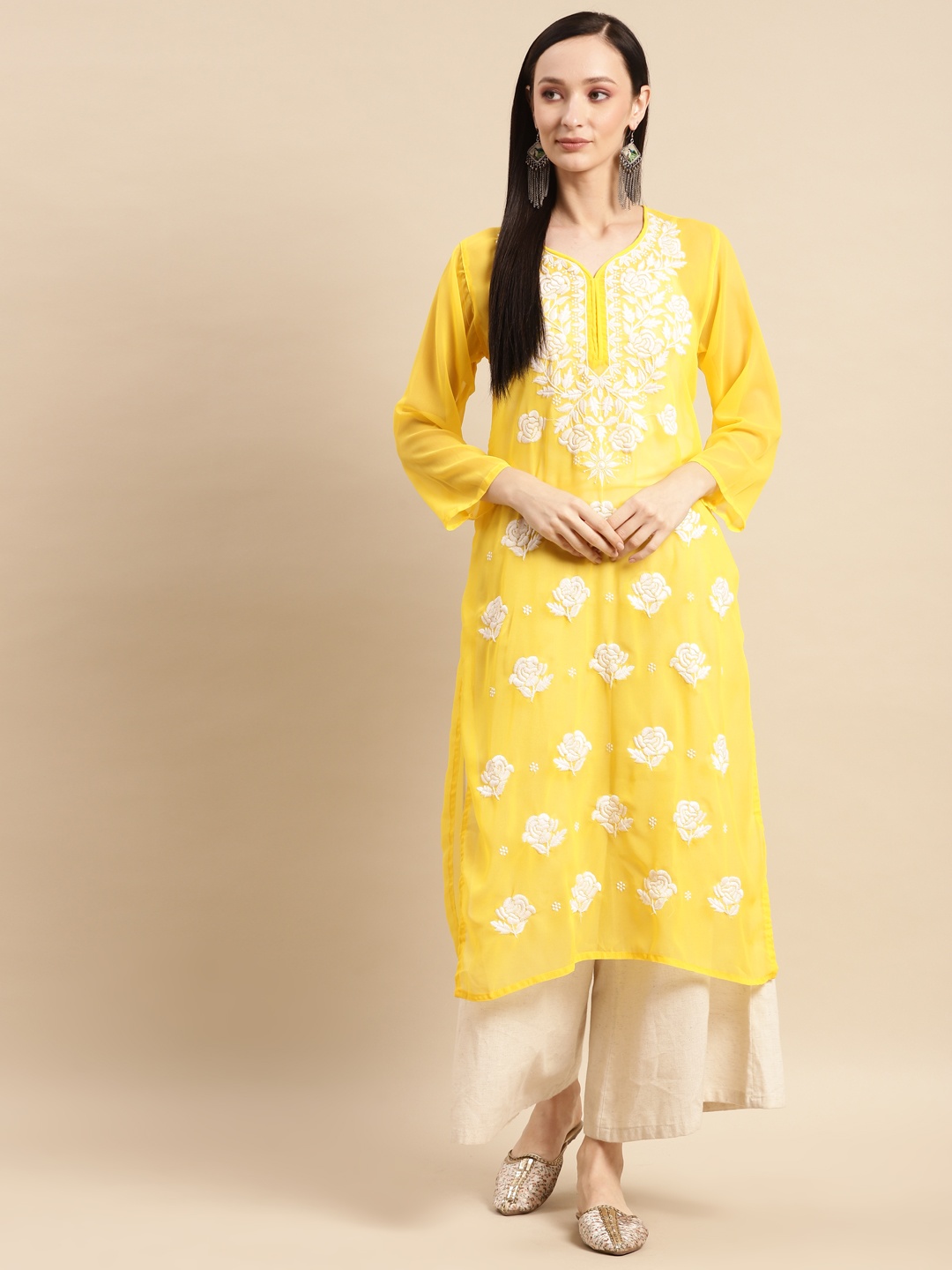 

Saadgi Women Yellow & White Floral Embroidered Chikankari Floral Georgette Kurta