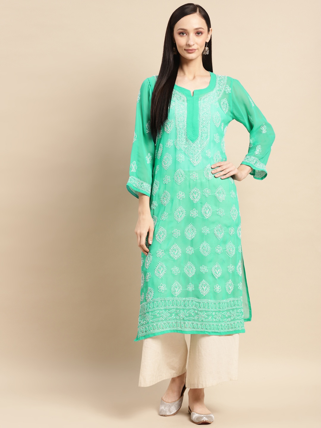 

Saadgi Women Sea Green & White Ethnic Motifs Embroidered Chikankari Georgette Kurta