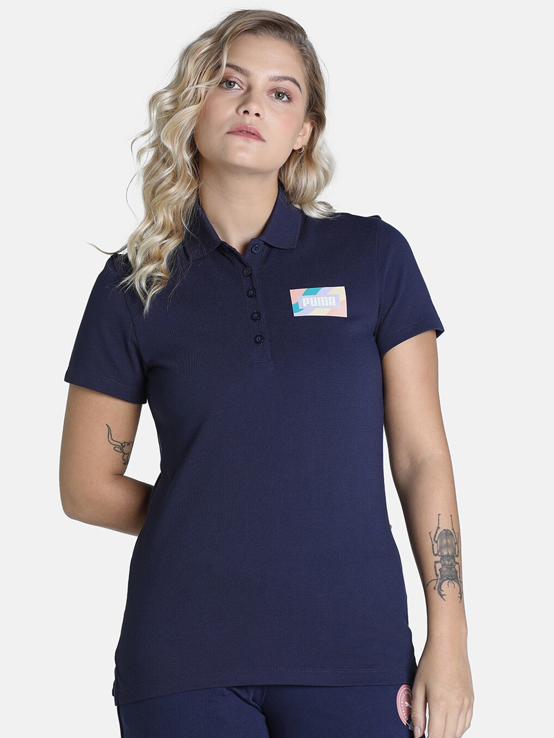 

Puma Women Navy Blue Regular Fit Solid Wavy Box Graphic Polo Collar Cotton T-shirt