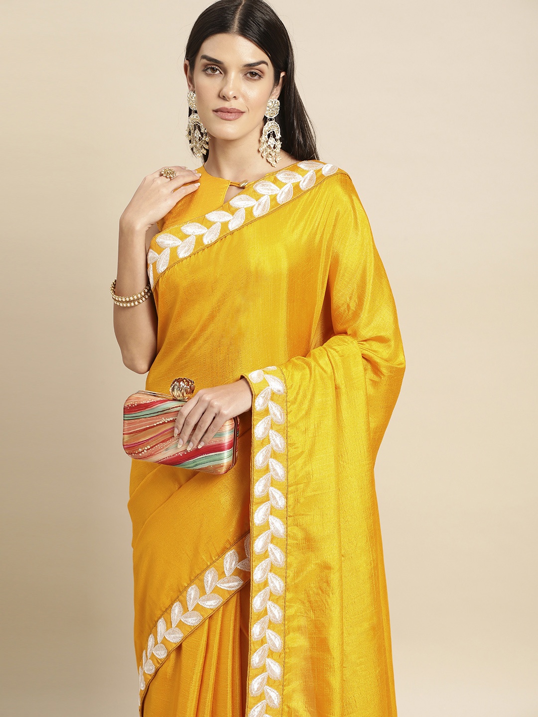 

Vaidehi Fashion Floral Silk Blend Saree, Yellow