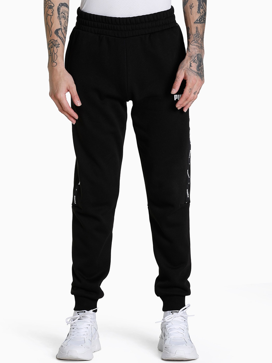 

Puma Men Black Solid Essentials+ Tape Regular Fit Joggers