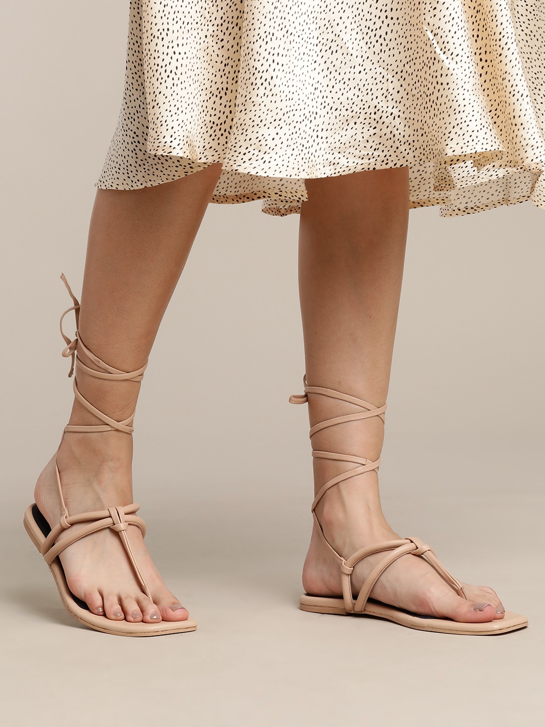 

Nautica Women Beige Solid T-Strap Flats with Lace-up Details